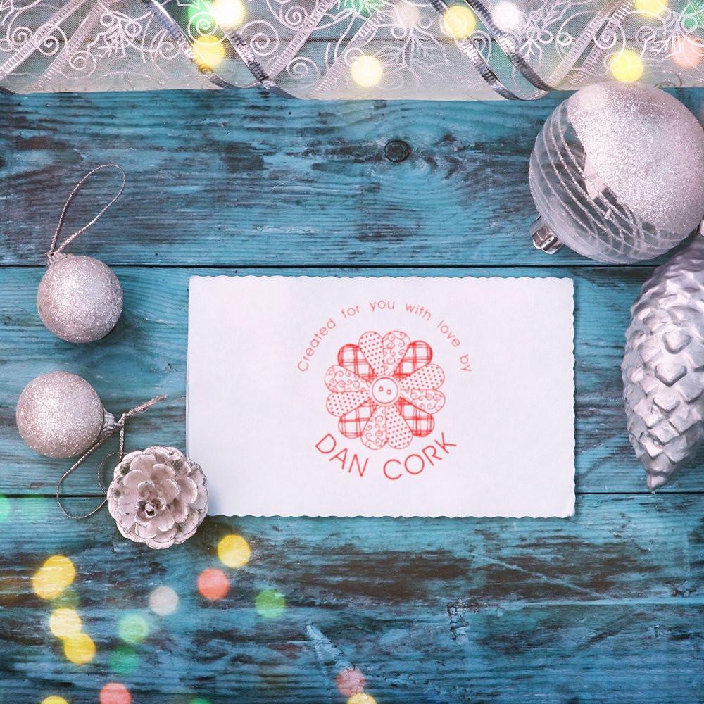 Custom rubber stamp impression on handmade card, reading Created for you with love by Dan Cork.
