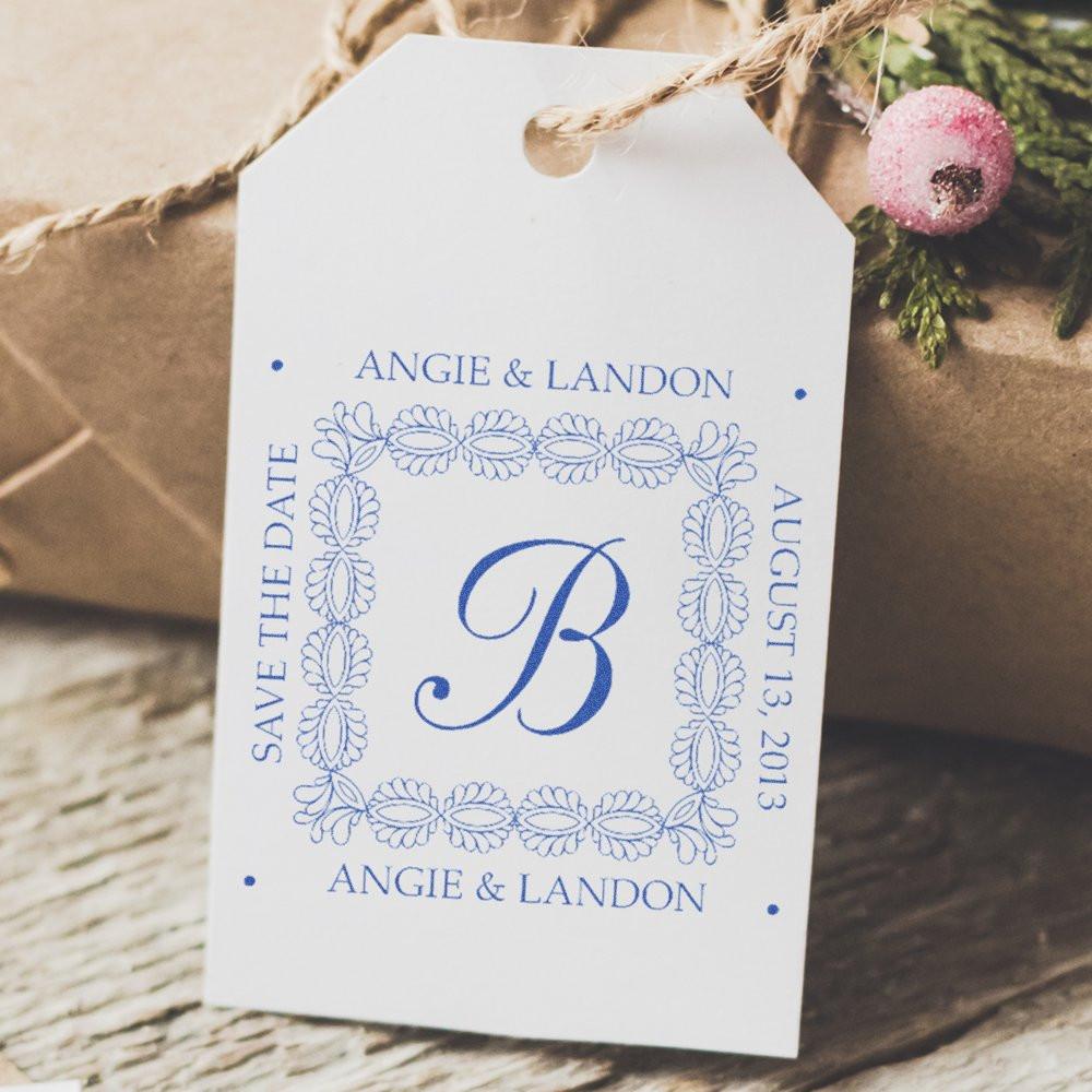 Personalized wedding rubber stamp on favor tag featuring monogram B, Angie & Landon, and save the date details.