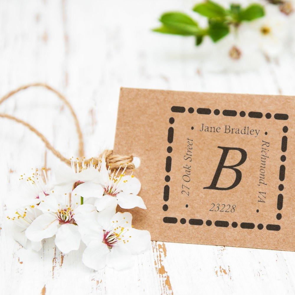 Personalized return address rubber stamp with monogram B, Jane Bradley name, and Richmond, VA address on kraft card.