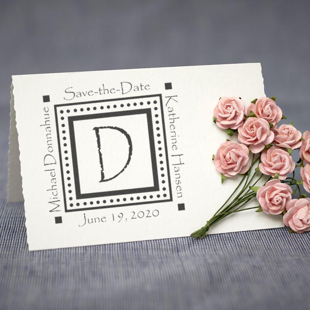 Custom wedding save-the-date rubber stamp with monogram D, names, and date for personalized invitation cards.