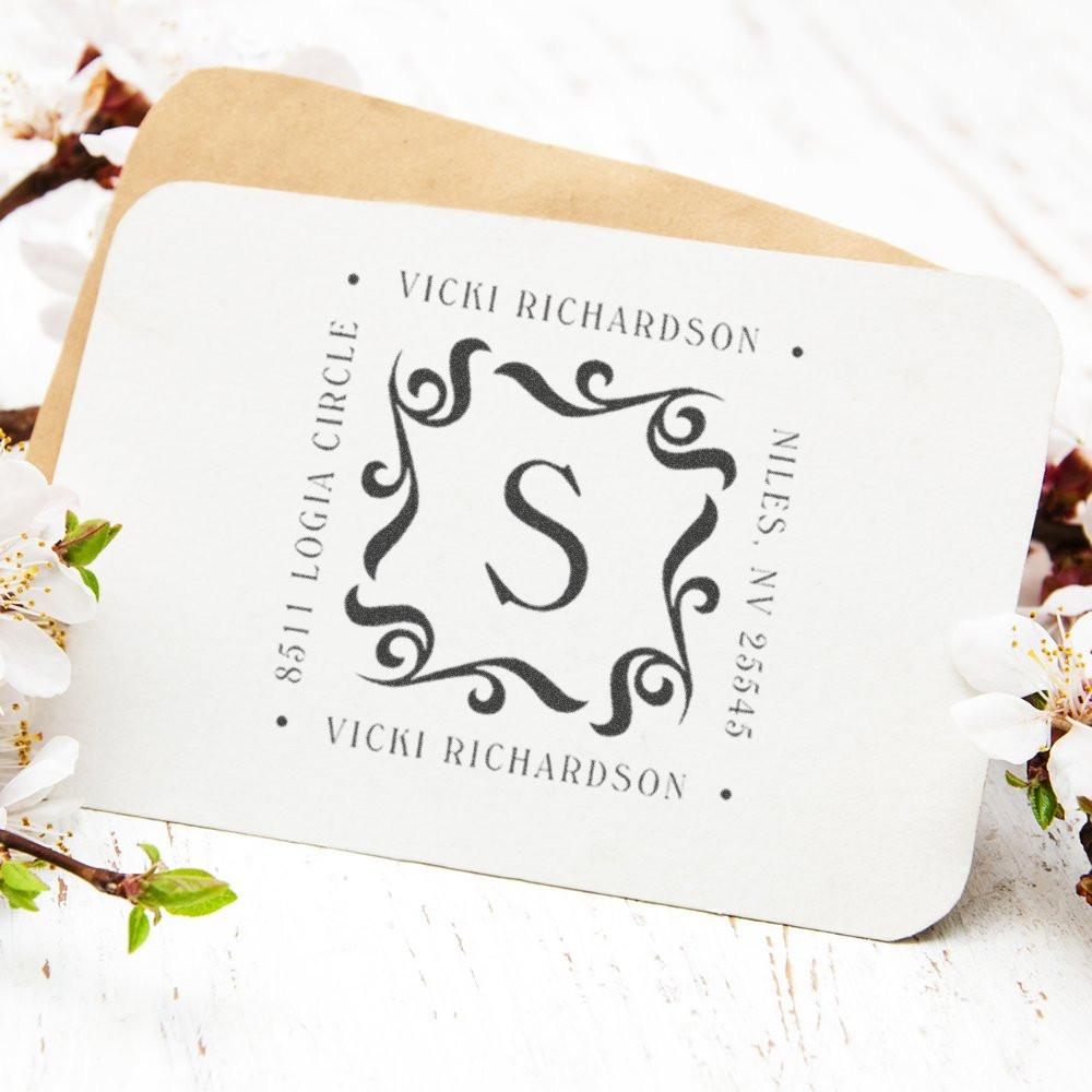 Vicki Richardson brand card with decorative monogram and name, ideal for luxury gifting, personalized calligraphy style, on floral background.