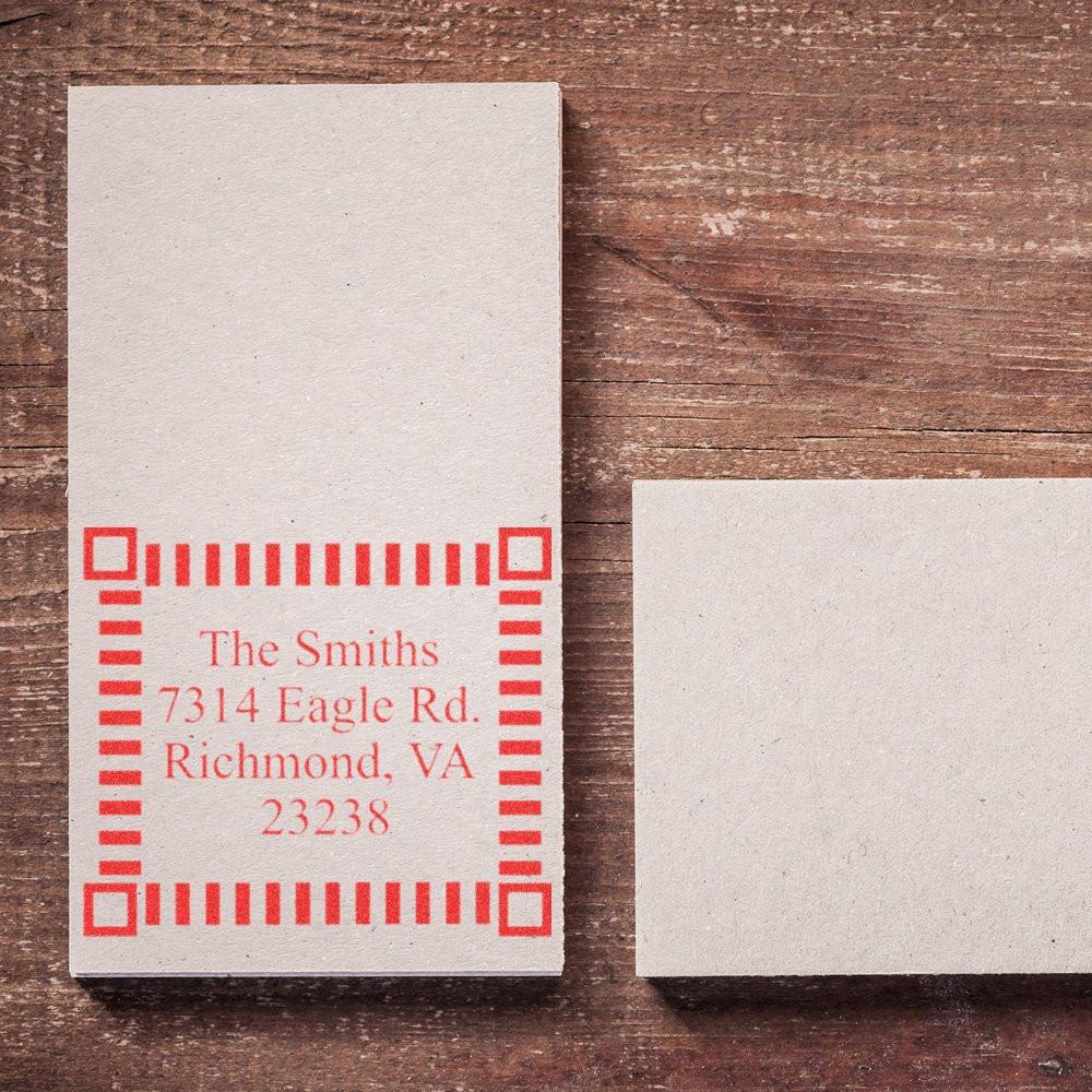Address label for The Smiths, 7314 Eagle Rd, Richmond VA 23238 on rustic wooden background with a blank label