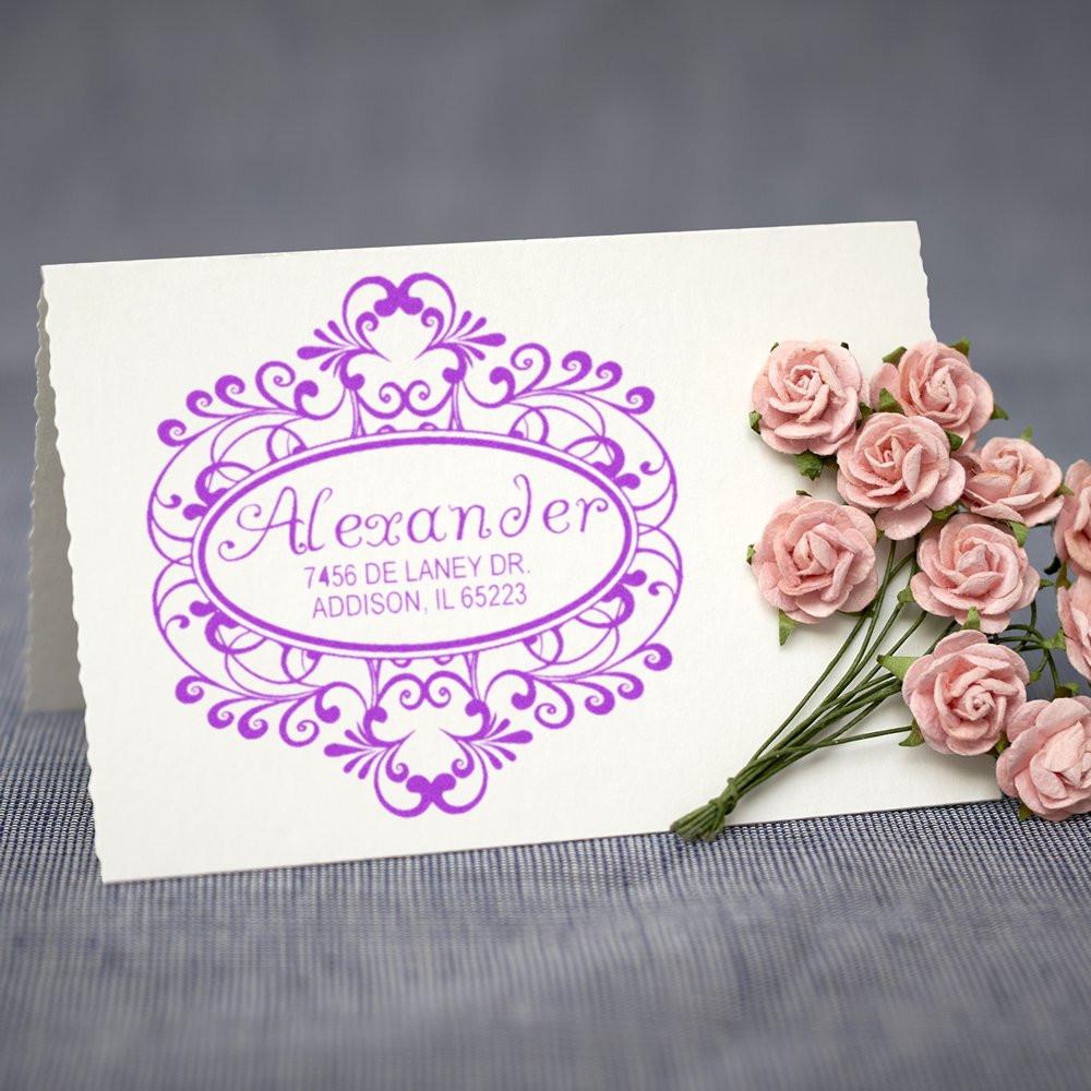 Custom monogram return address rubber stamp with ornate purple design, ideal for wedding invitations and stationery.
