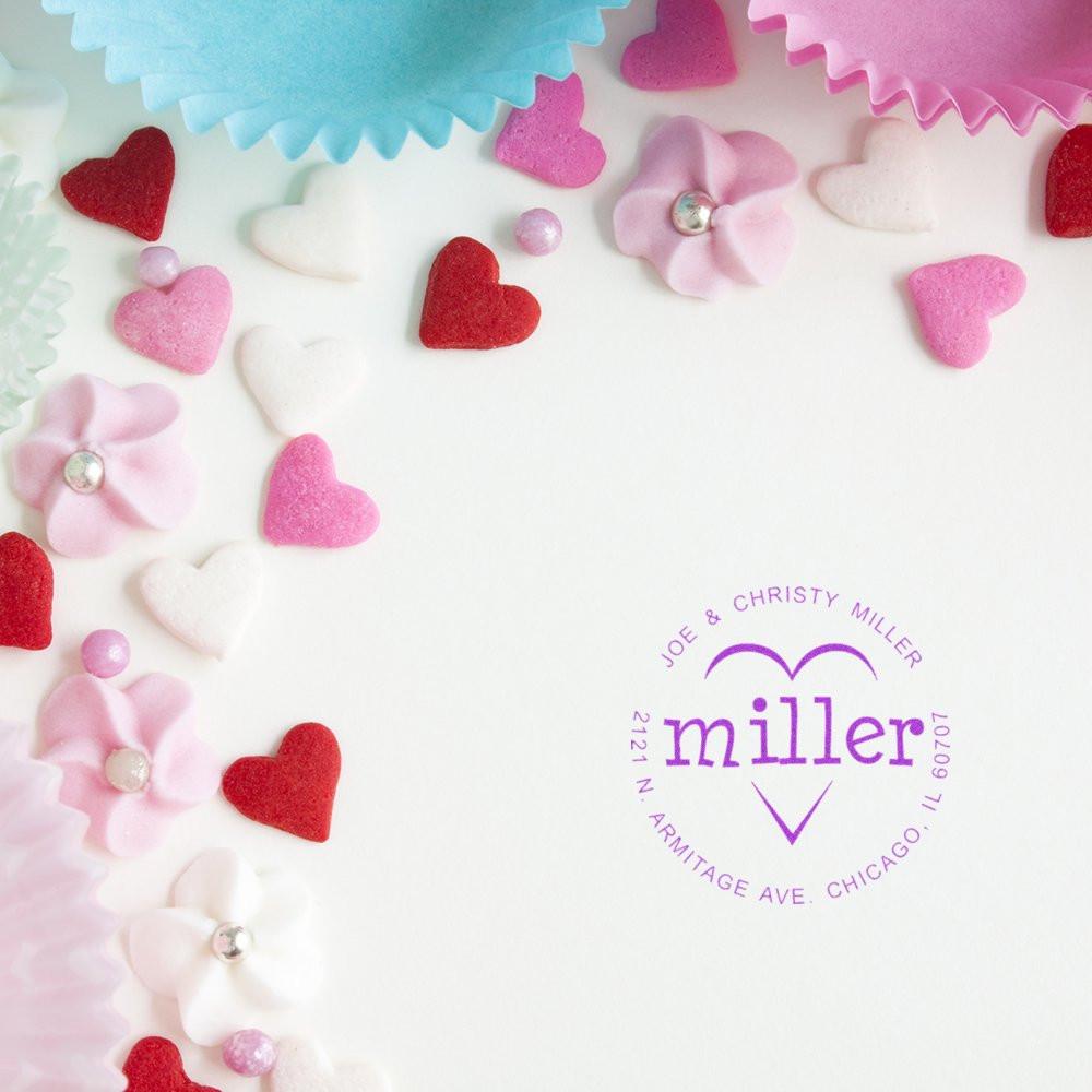 Personalized wedding return address rubber stamp with Miller family name and heart design for envelopes and stationery.