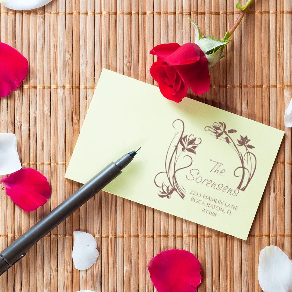 Custom floral return address rubber stamp for wedding invitations, featuring elegant monogram style.