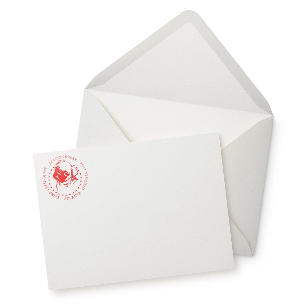Custom return address rubber stamp on envelope and stationery for personalized business or wedding mailings.