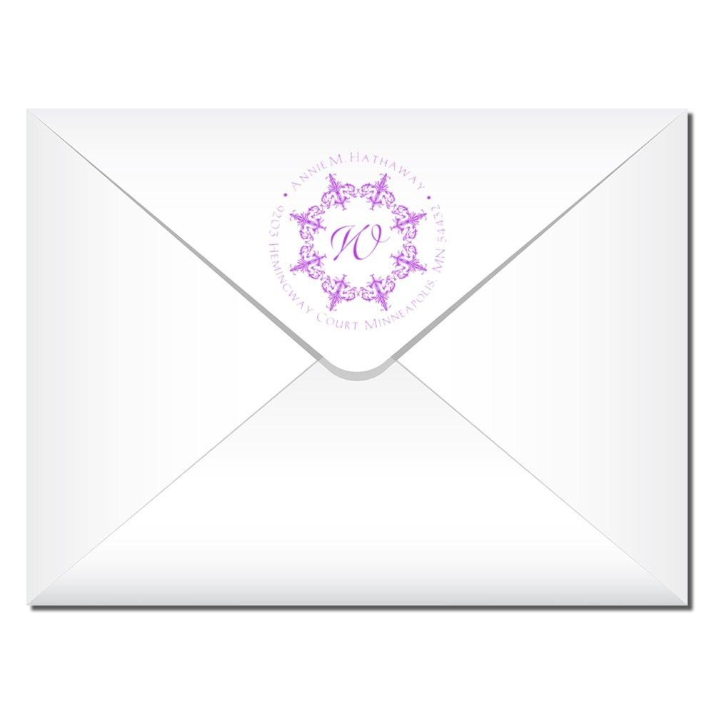 Custom rubber stamp return address on white envelope, ideal for wedding invitations, stationery, and personalized mailing.