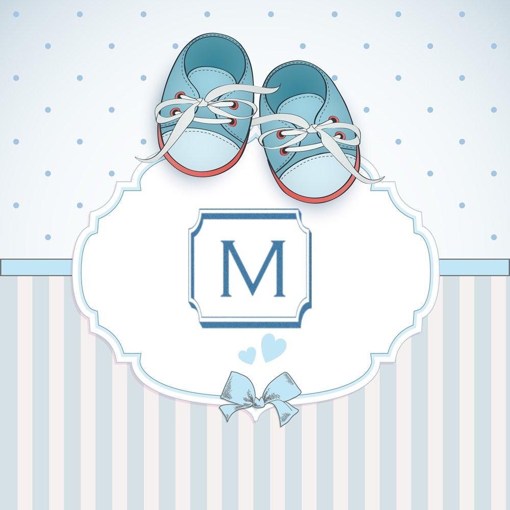 Personalized baby shower rubber stamp with monogram M, baby shoes, and pastel blue ribbon for custom invitation designs.