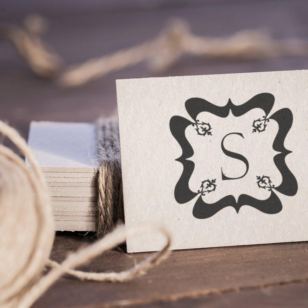Ornate monogram S rubber stamp for custom branding and personalized packaging