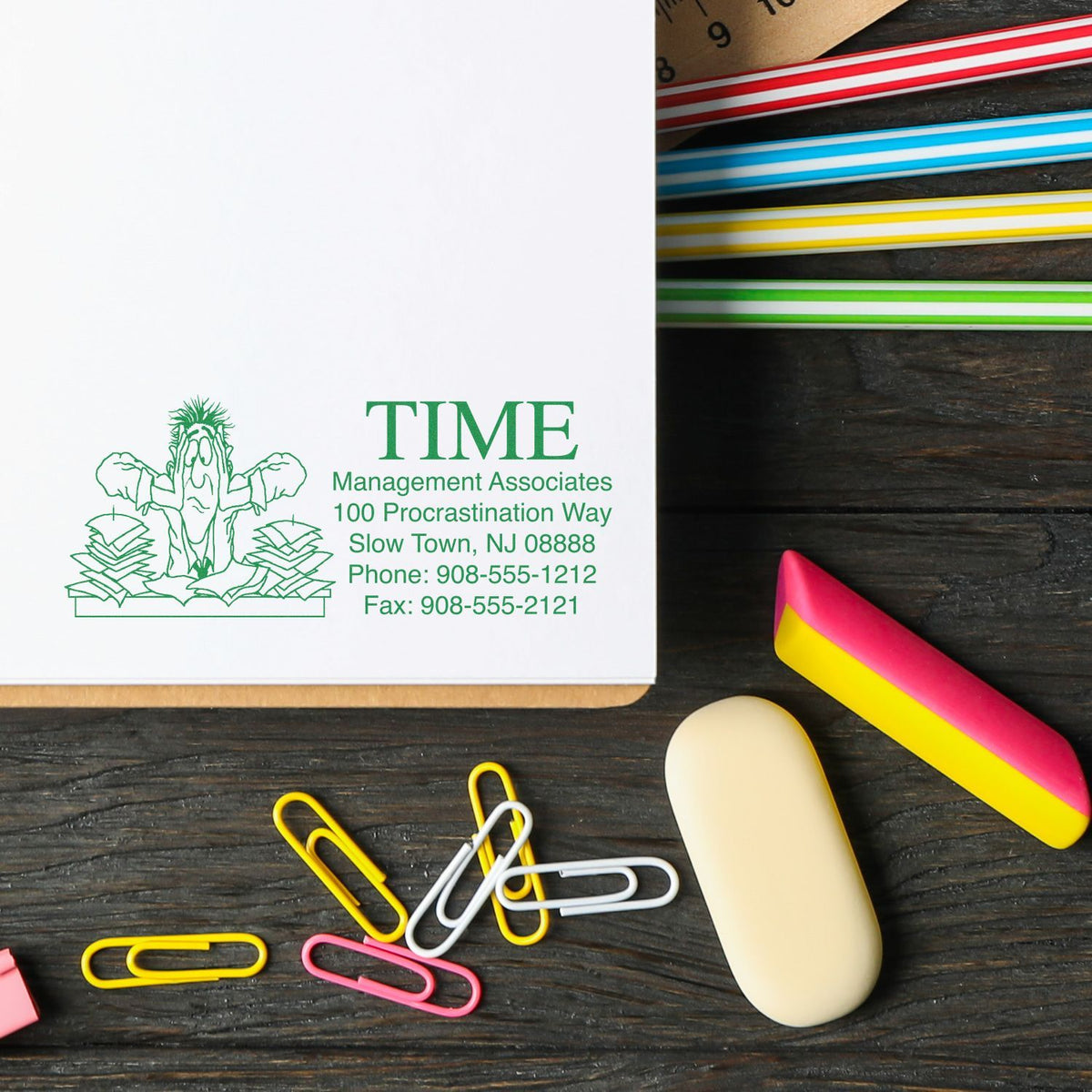 TIME Management Associates business card on desk with office supplies, including address in Slow Town NJ and phone for contact.