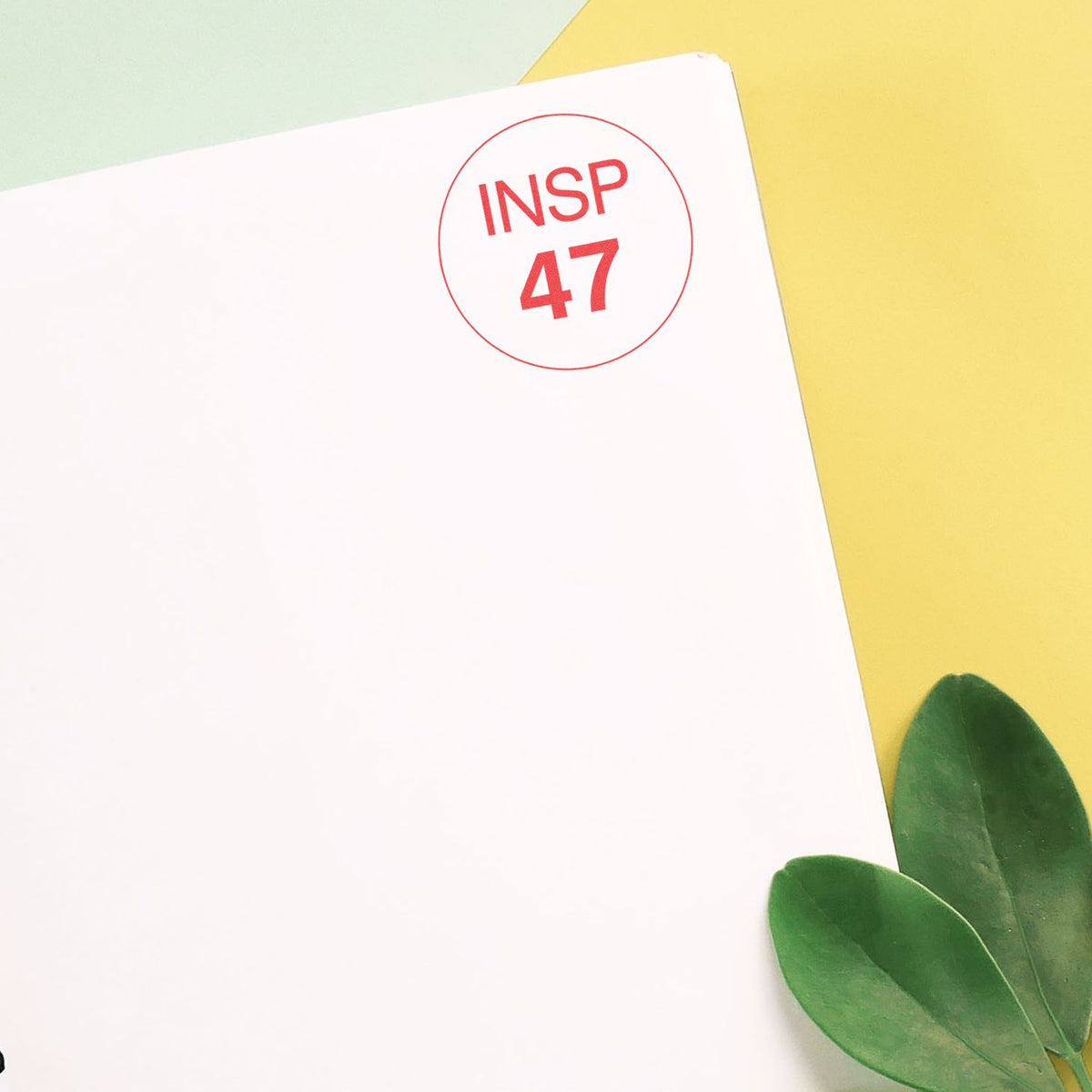 INSP 47 inspiration stamp on a white card with pastel background and green leavesbranding design for creative series