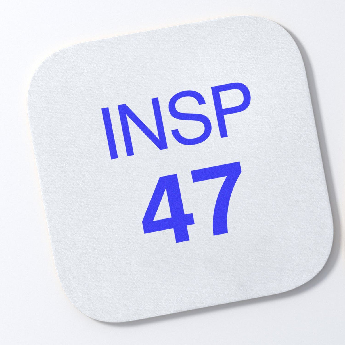 INSP 47 logo on white paper label, a branding mark for inspection services and training materials