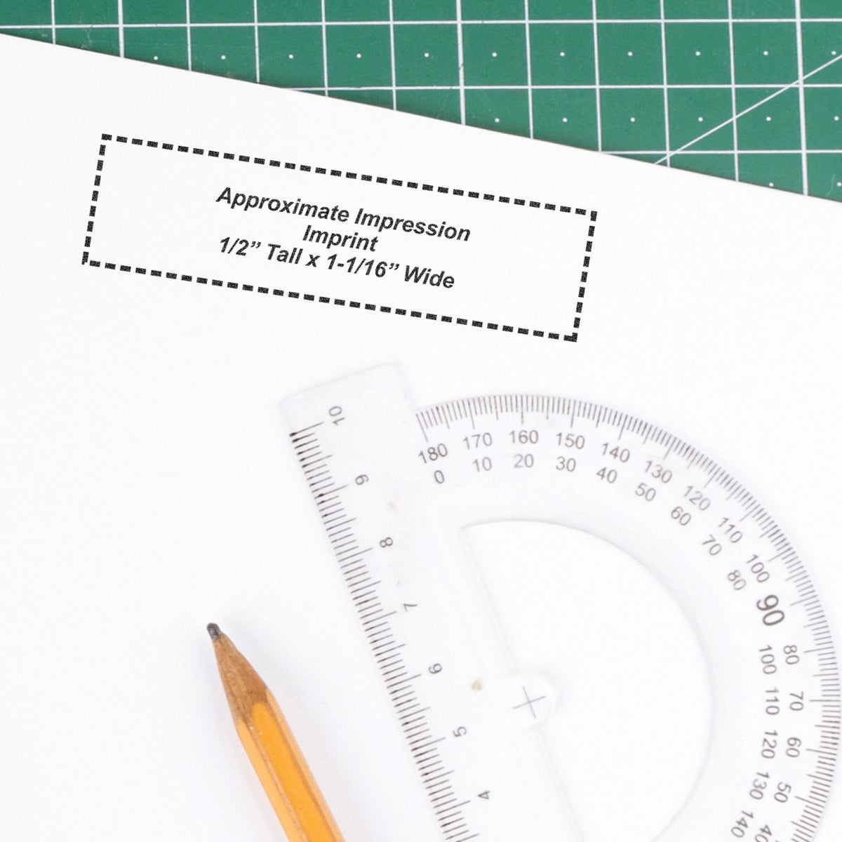 Measurement of imprint size: approximate 1/2-inch tall by 1-1/16-inch wide text layout on paper with protractor and pencil template.