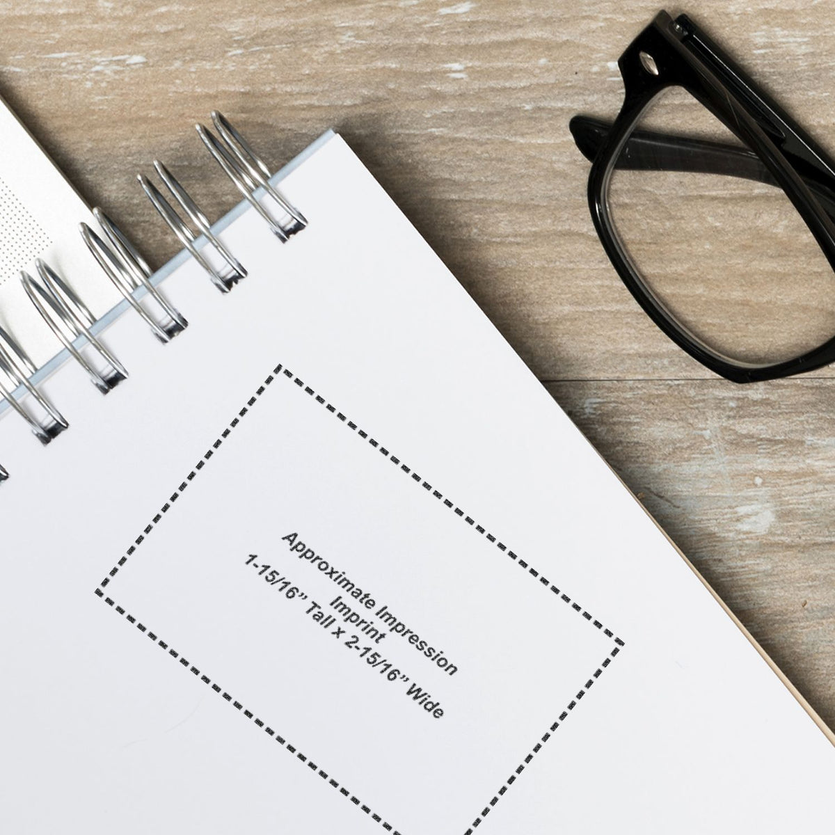 Document with Approximate Impression Time for printing estimates, with stapled pages and eyeglasses on office desk for graphic design workflow