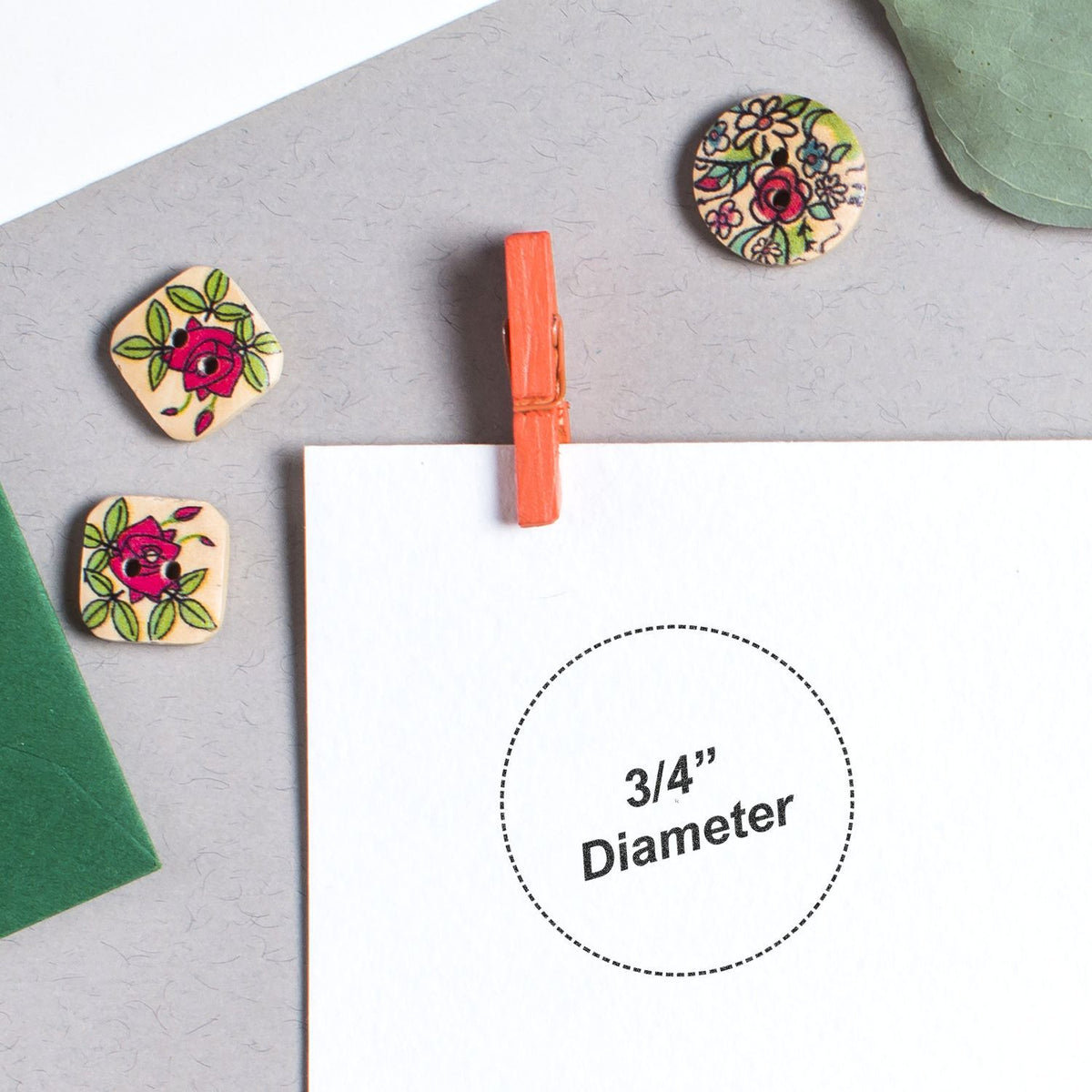 Set of floral thumbtacks showing 3/4-inch diameter size for bulletin board and crafts