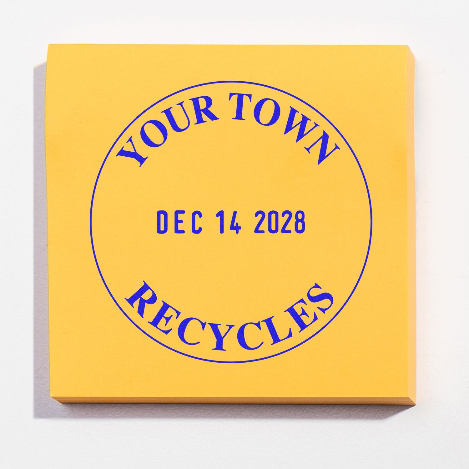 Yellow Your Town Recycles booklet cover with blue text and date Dec. 14, 2028.