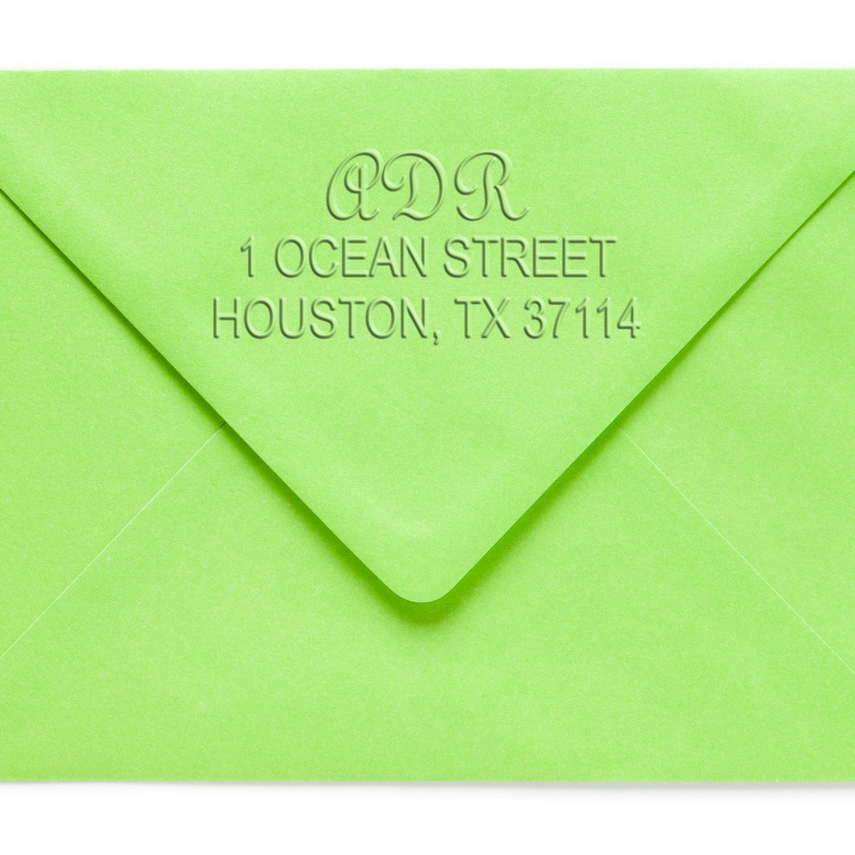 Lime green embossed envelope with ADR address, 1 Ocean Street, Houston, TX 37114