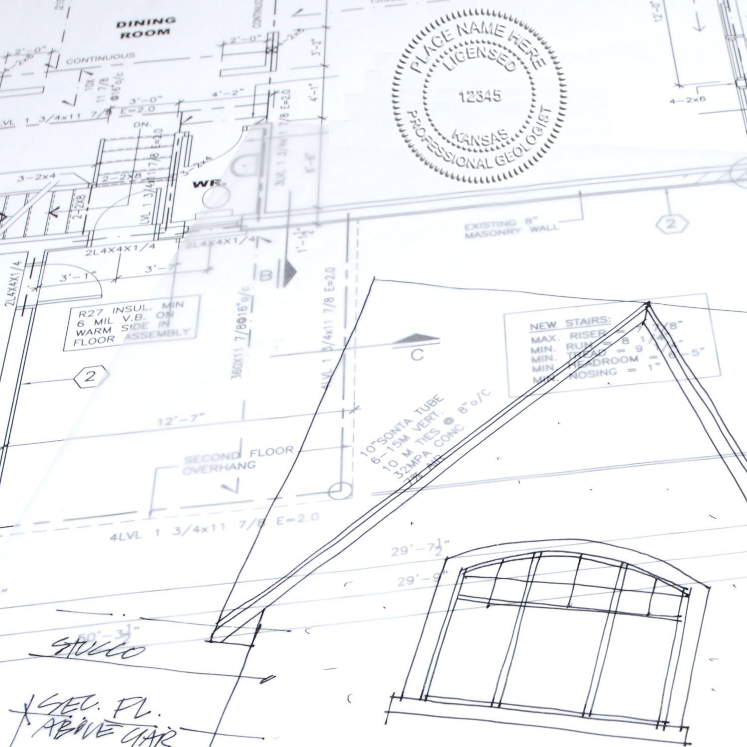 Architectural blueprint with licensed professional geologist stamp and hand-drawn building design sketches on construction plans