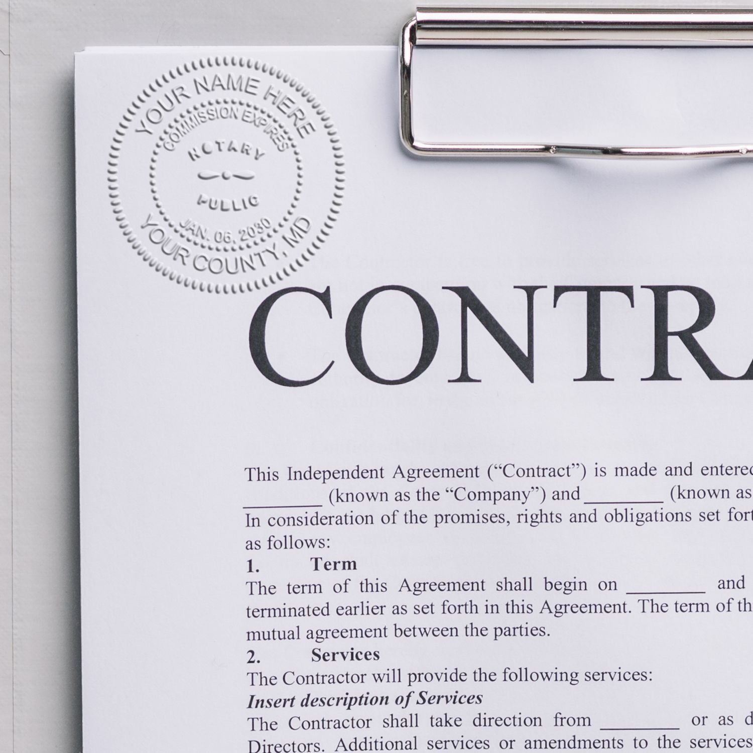 Contract agreement document on clipboard with notary stamp and legal form text.