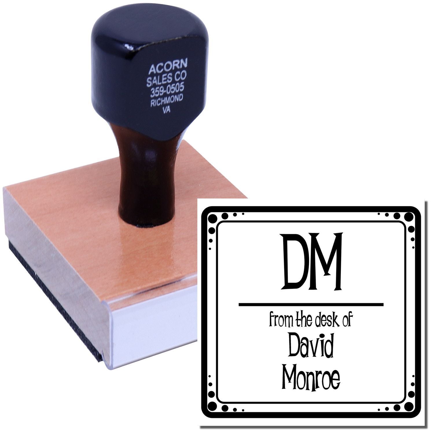 Personalized rubber desk stamp with custom From the Desk of David Monroe imprint for office correspondence.