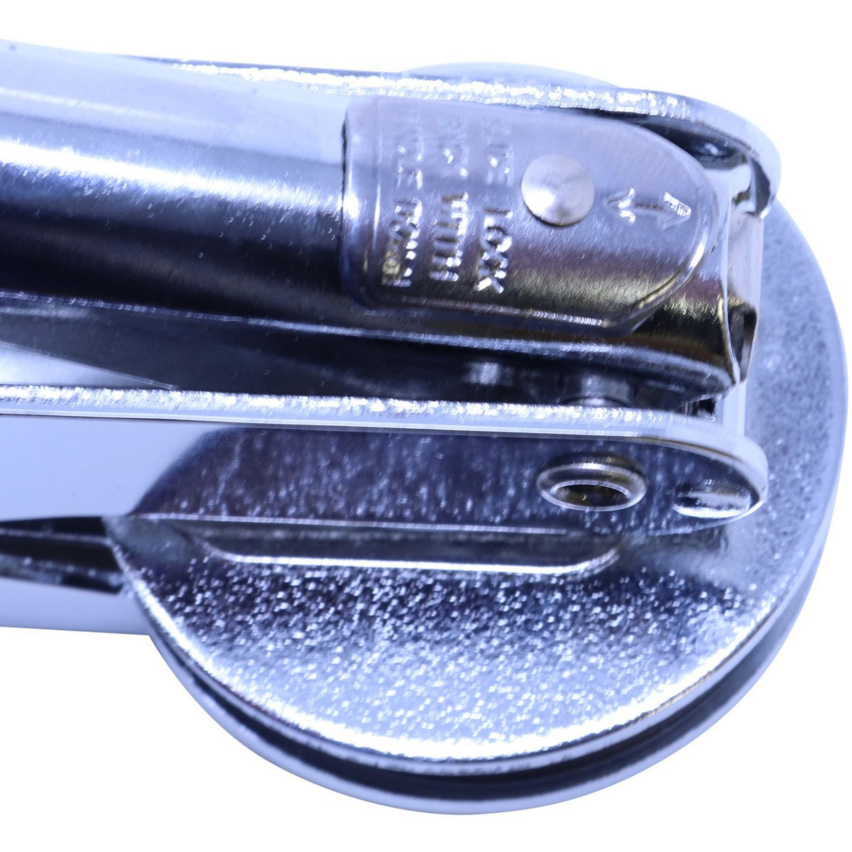 Close-up of a black metal stapler hinge with chrome details on a white background