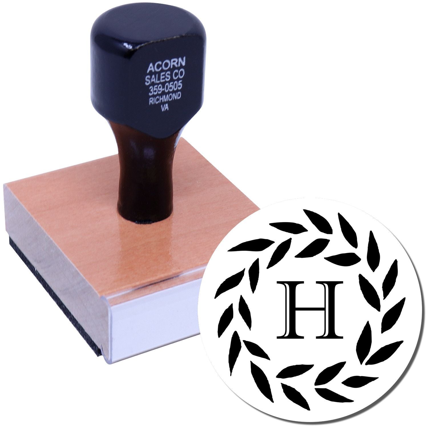 Custom rubber stamp with monogram H and leaf wreath design for personalized branding, invitations, and stationery.