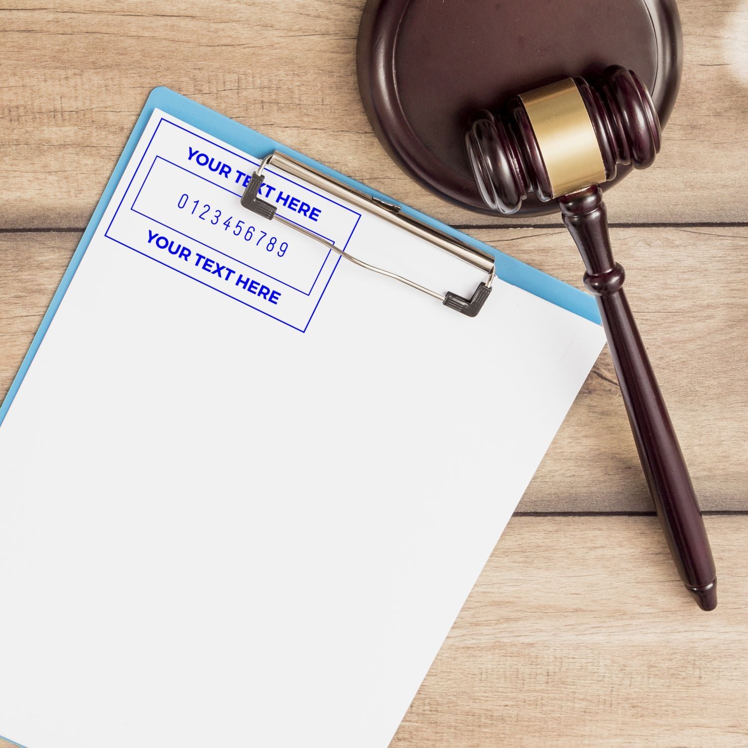 Legal document template on clipboard with placeholder text and gavel, symbolizing contract review and court proceedings on wood desk