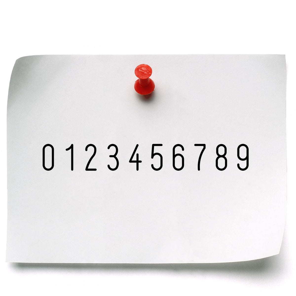 Paper note pinned with red thumbtack showing digits 09 for math education and number sequence reference.