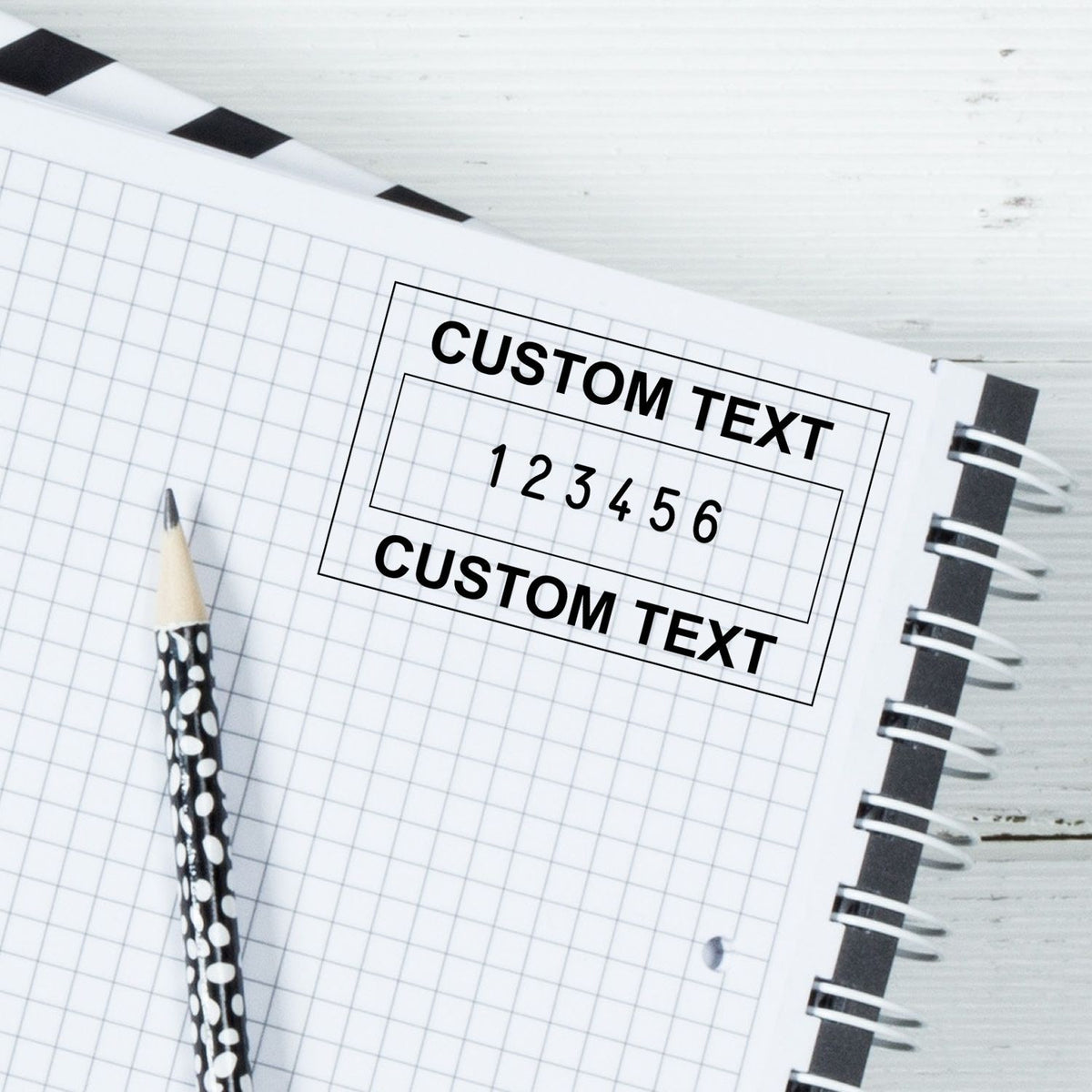 Custom text template on graph paper with 123456 digits and pencil, promoting personalized design text editing.