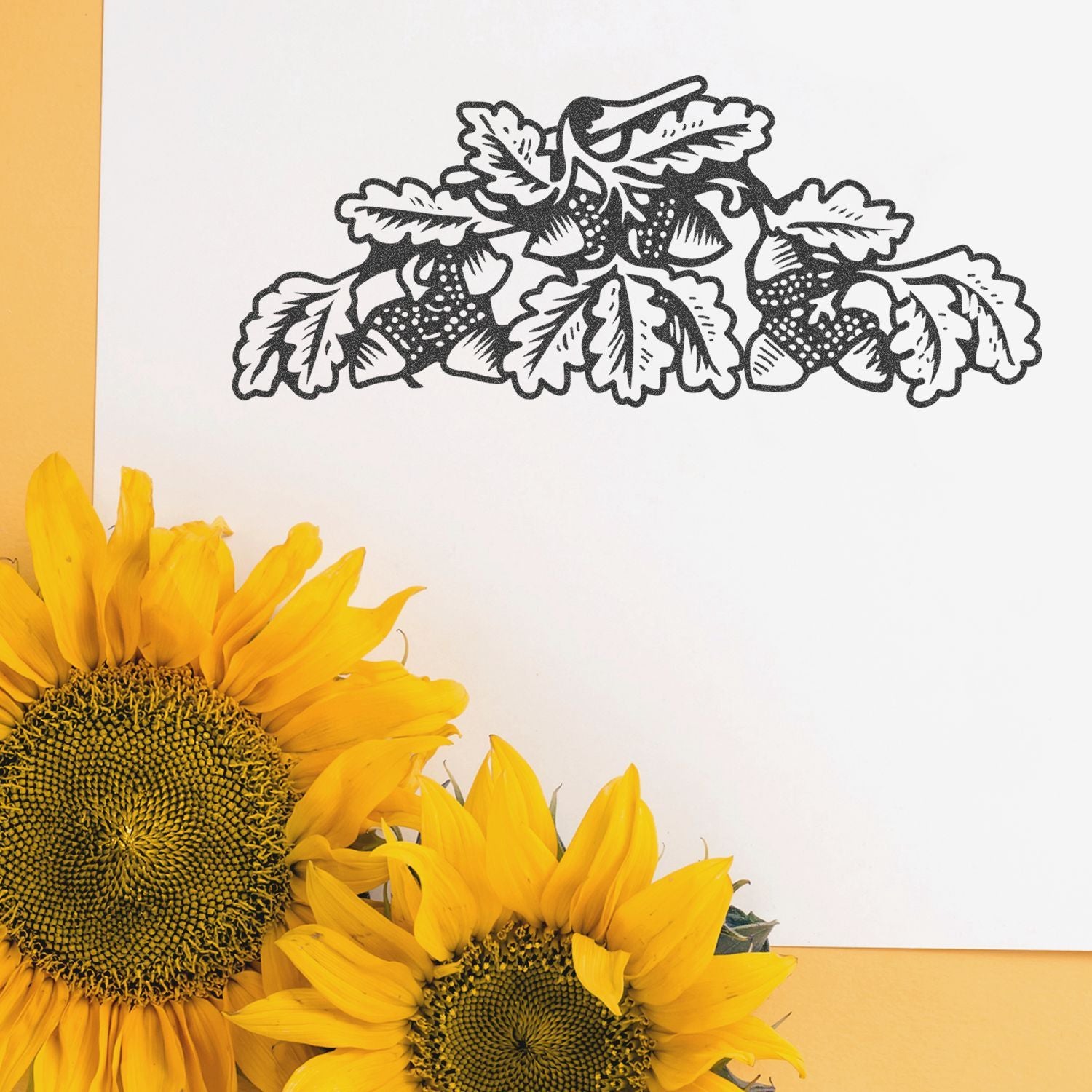 Black floral botanical illustration on white paper with bright yellow sunflowers on a warm yellow background.