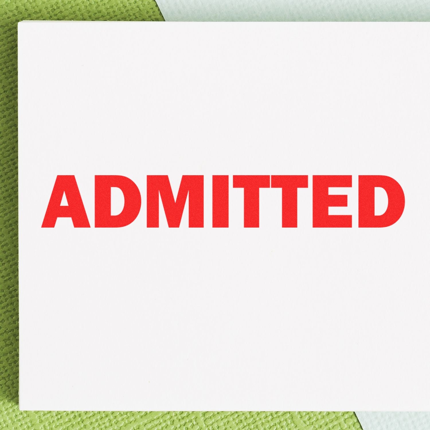 Admissions card with the word ADMITTED in red, indicating an accepted enrollment status.