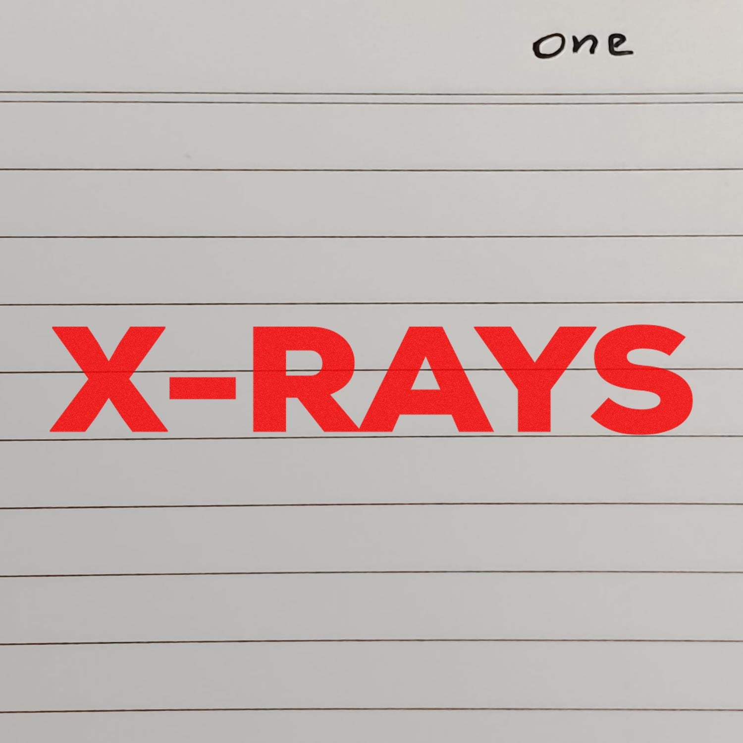 X-RAYS signage on a wooden board, indicating a medical radiology imaging area for diagnostic X-ray scans.