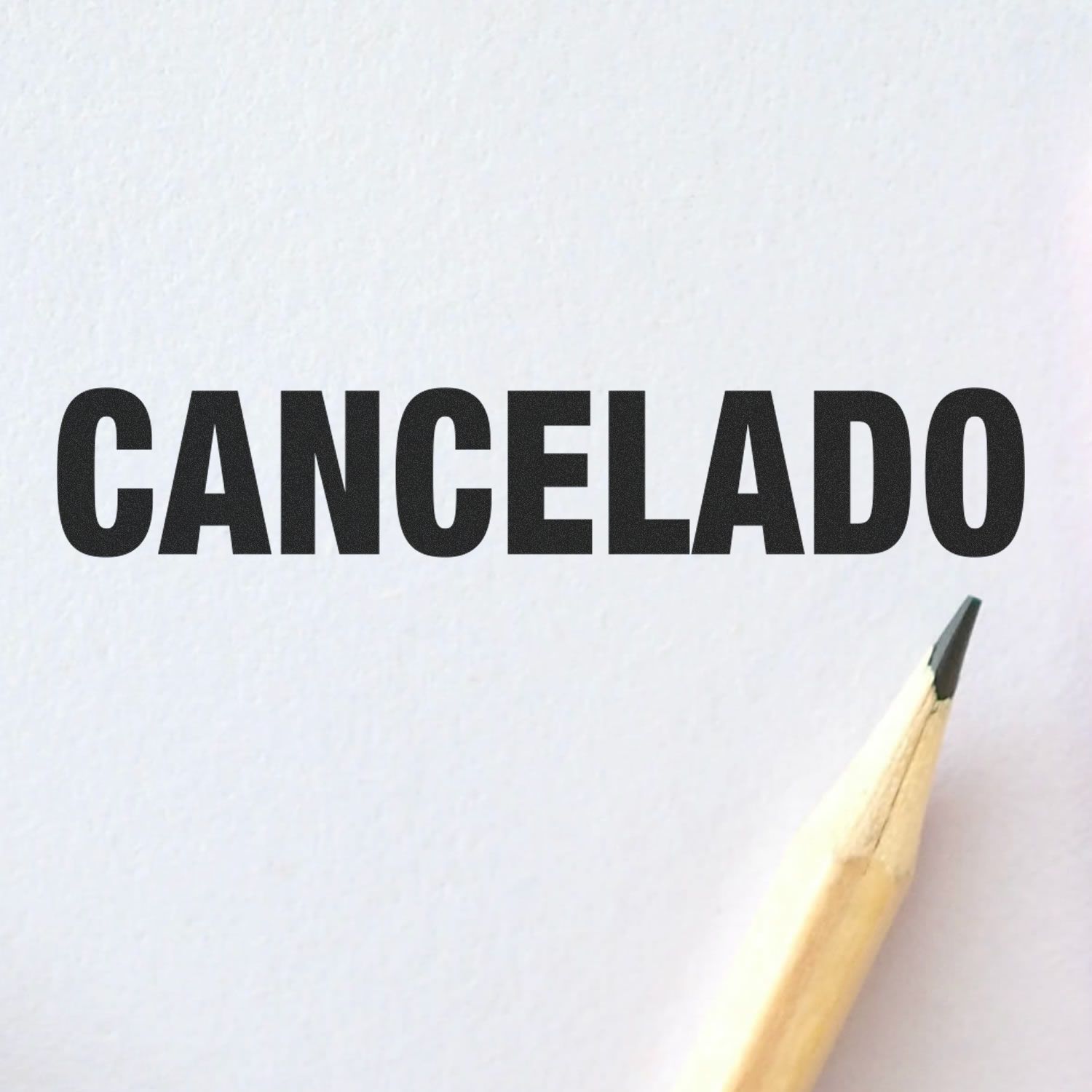 Black CANCELADO text on white paper with a pencil tip, symbolizing cancellation or deletion.