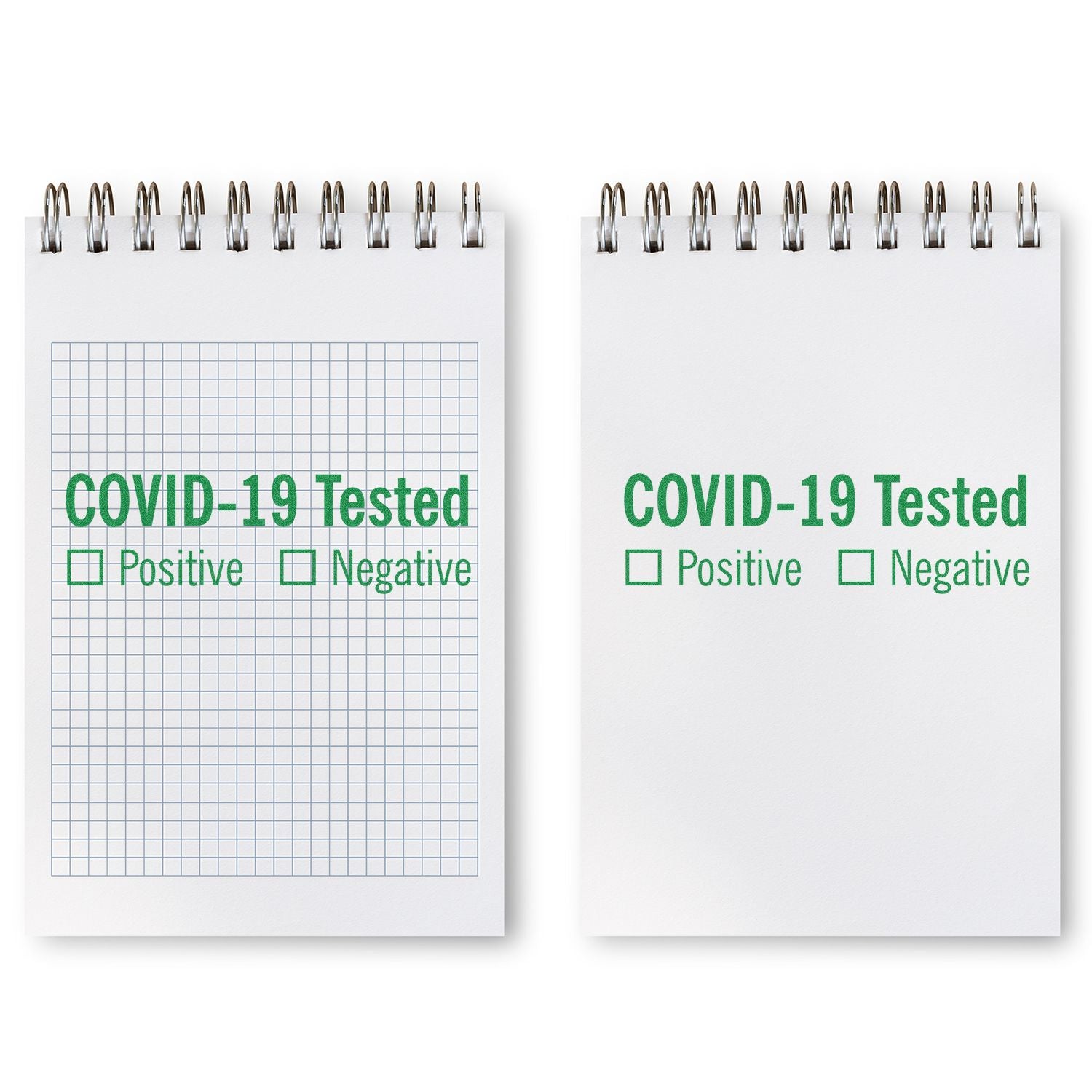 Two spiral-bound notebooks labeled COVID-19 Tested with Positive and Negative checkboxes, for tracking test results.