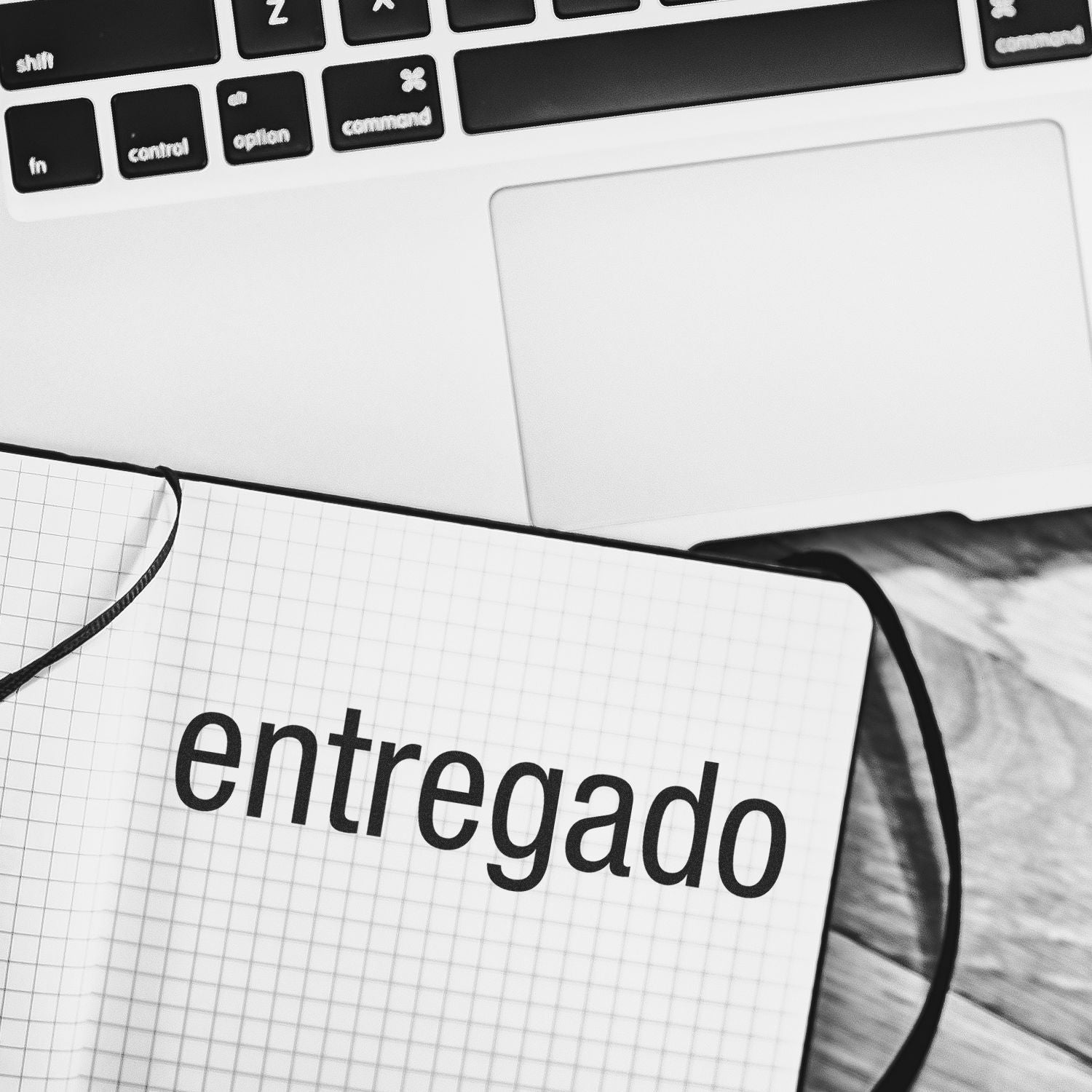 Entrepreneur concept with laptop keyboard and notebook labeled entrepreneur, illustrating business planning, startup ideas, and strategy.