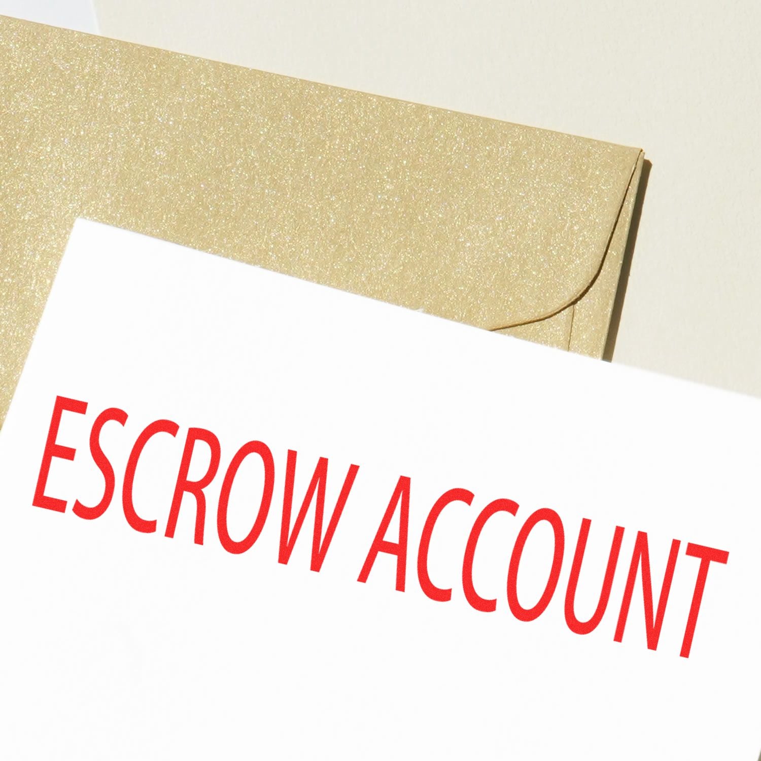 Gold envelope with Escrow Account document, representing secure real estate payment and trust fund services.
