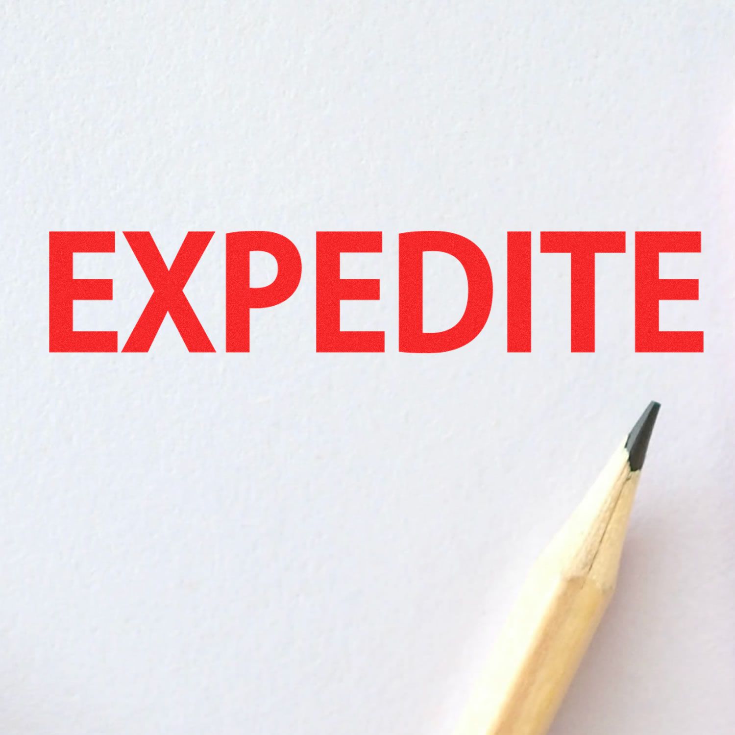 Red EXPEDITE text on white paper with pencil tip, symbolizing fast processing and quick delivery.