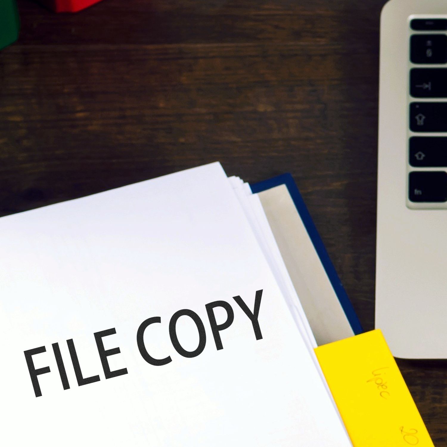 File copy document packet and folders on desk, illustrating office copying, print paperwork, and document filing process
