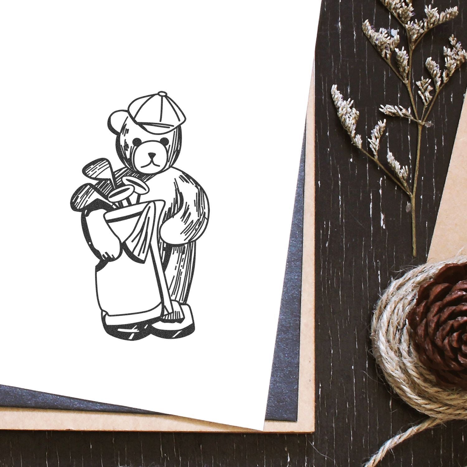 Hand-drawn teddy bear gardener illustration on paper with rustic wooden decor and pinecone background