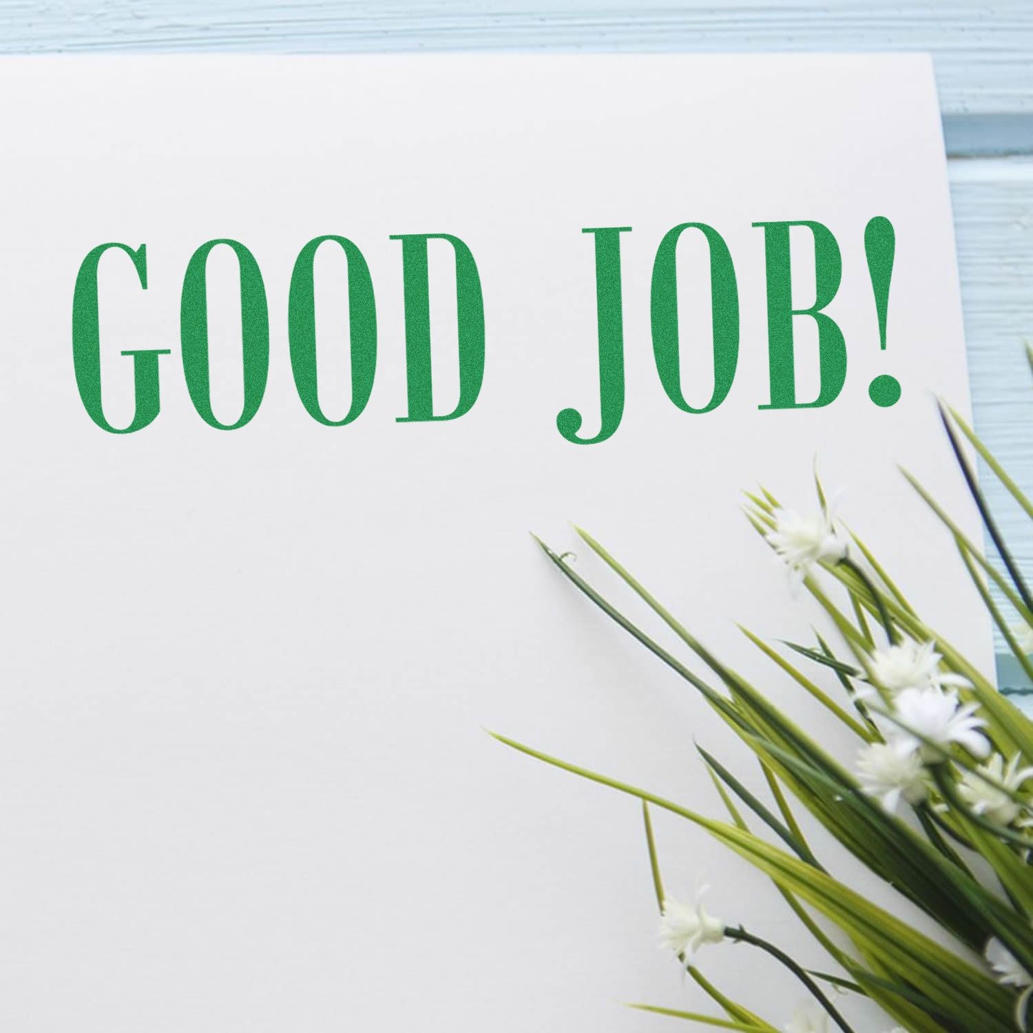 Good job! congratulatory card with green text and fresh flowers, celebrating achievement and positive encouragement.