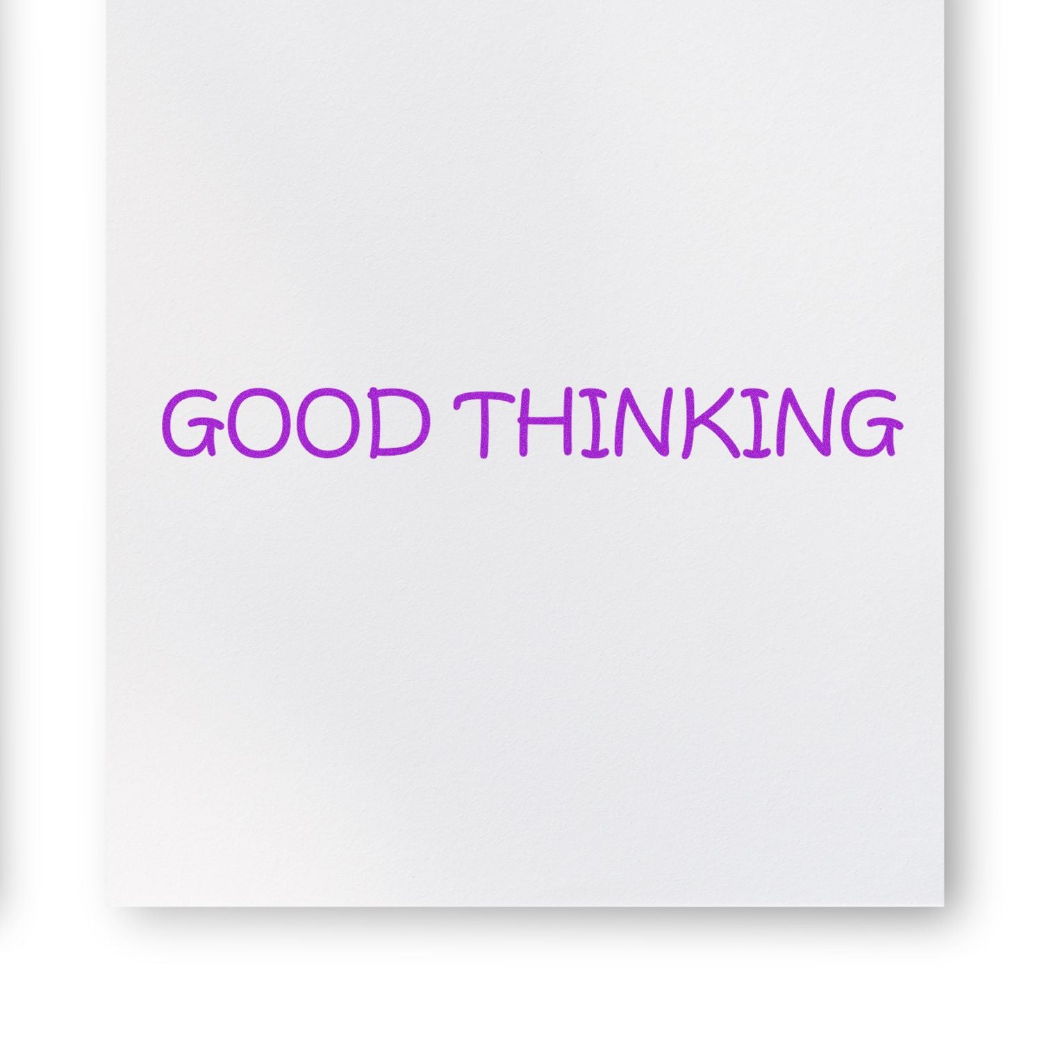 Purple GOOD THINKING text on white paper background, minimal motivational quote design.