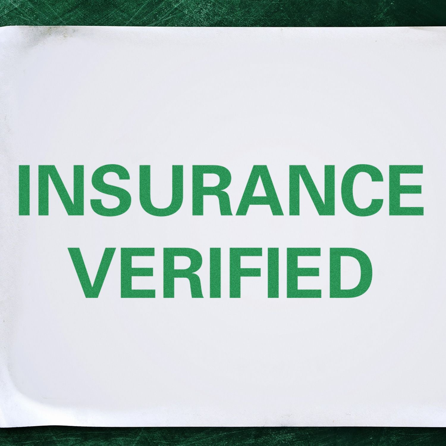 Insurance Verified stamp text on white paper, green lettering indicating confirmed insurance coverage.