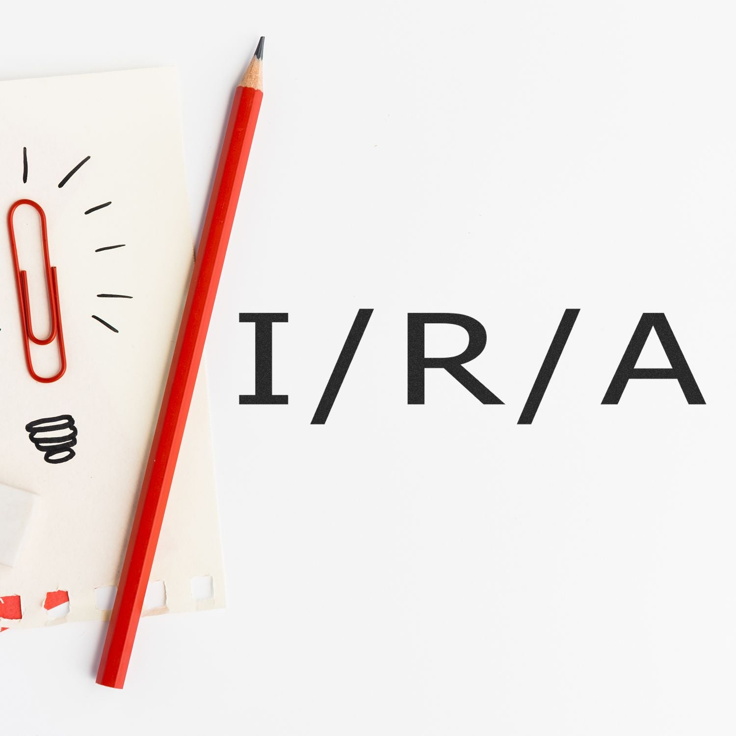 Red pencil and paper with writing doodles beside IRIA text, highlighting education and creative learning on a white background.