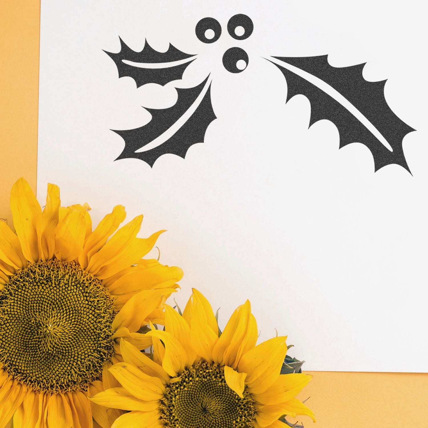 Sunflowers with black bat Halloween decorations on a white background, autumn floral seasonal design