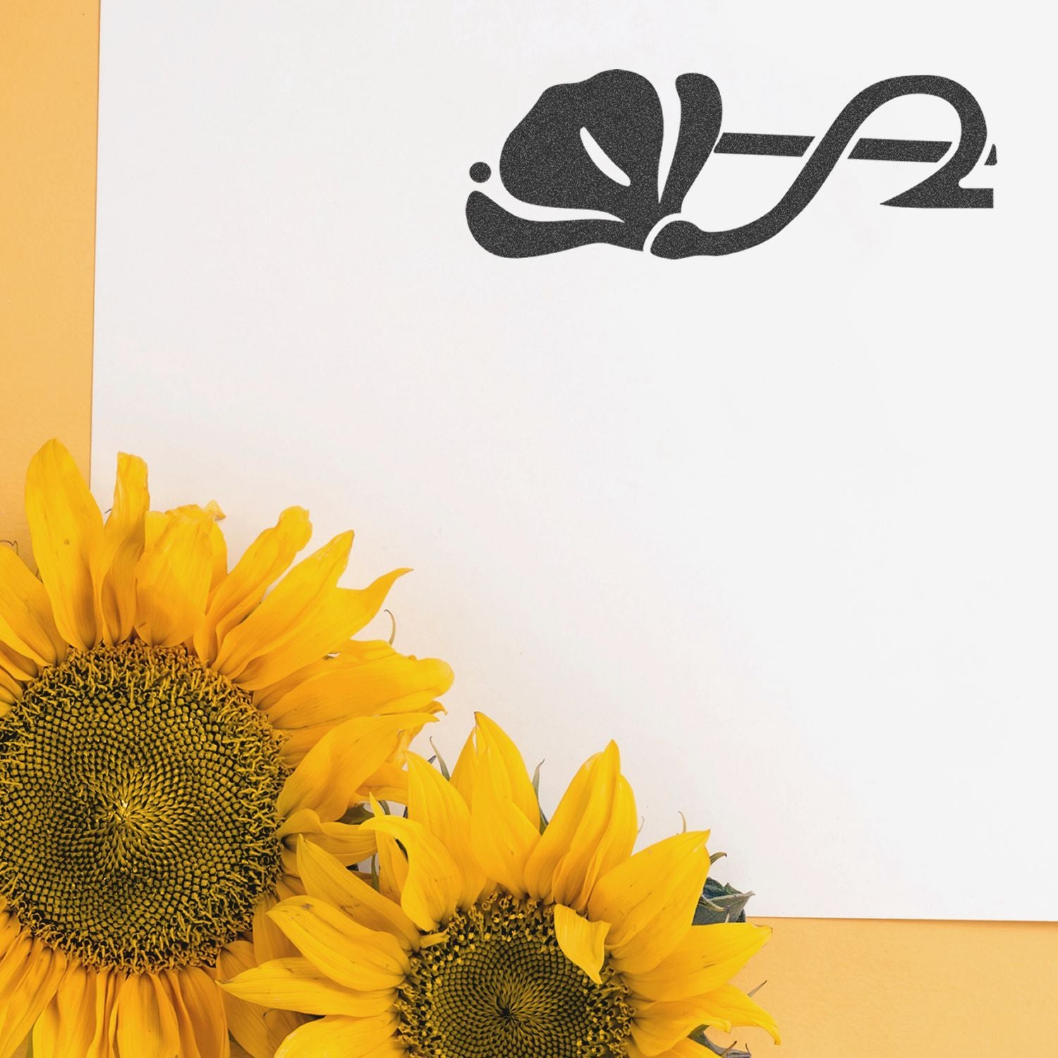 Bright yellow sunflowers with a black floral logo on a white background, nature-inspired flower design.