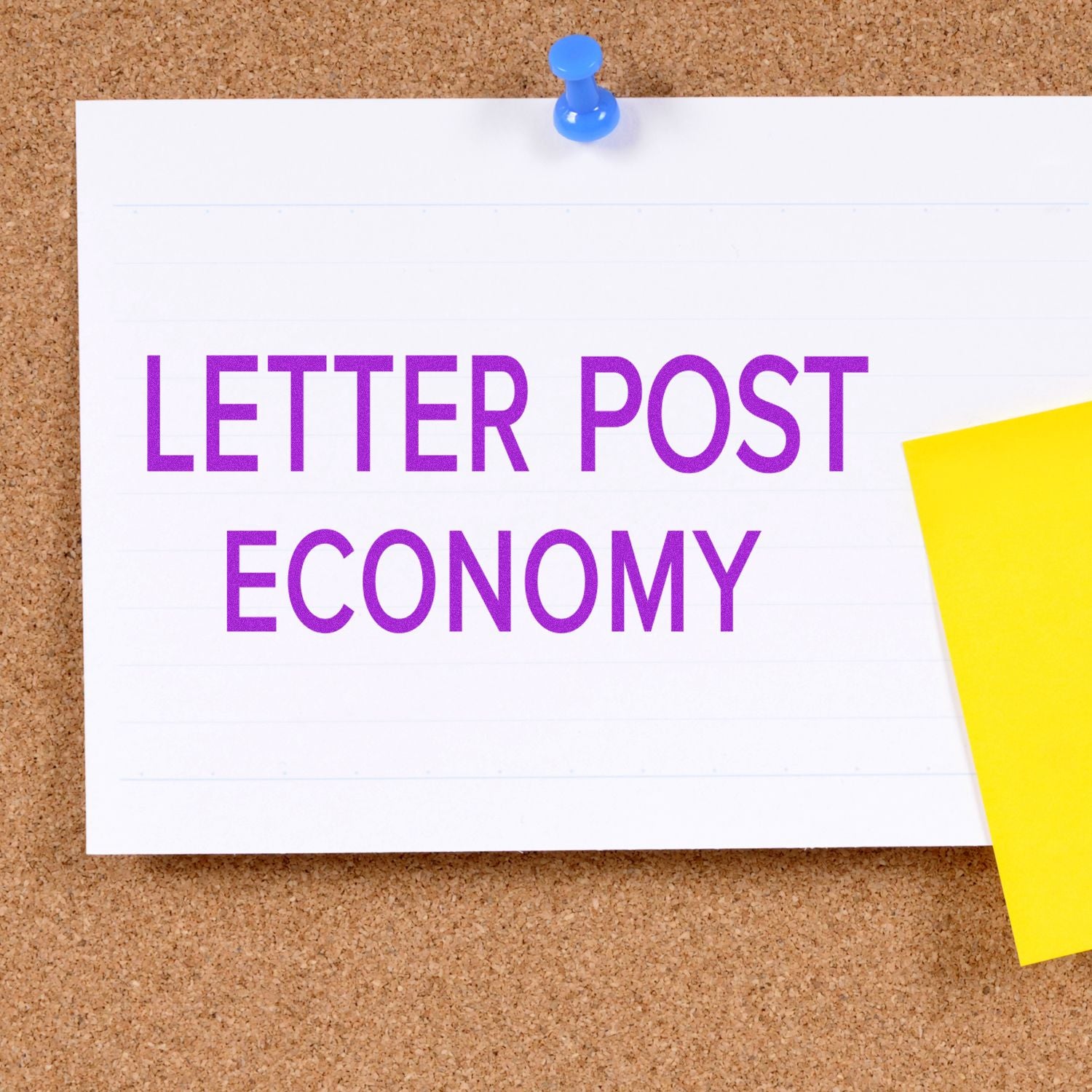 Letter post economy text on a pinned note board with a yellow sticky note.