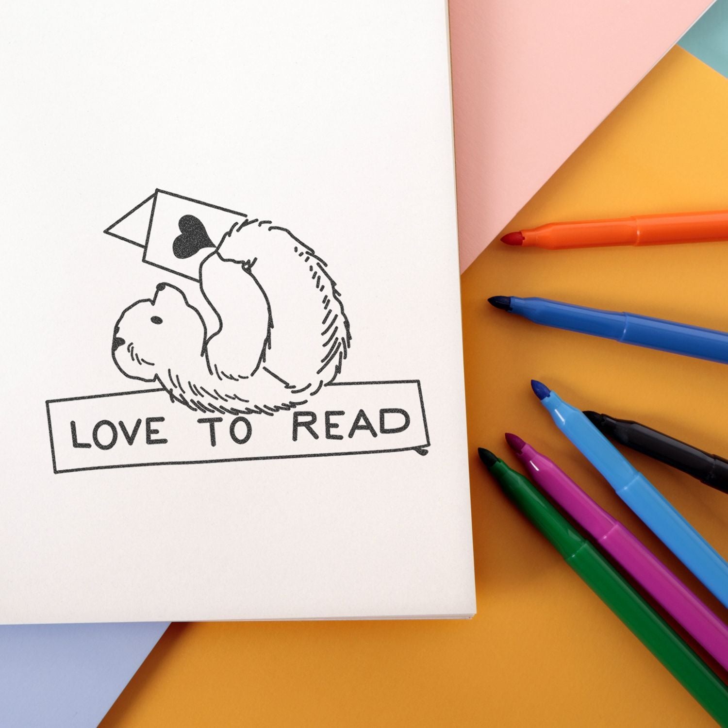 Cute Love to Read bear doodle on white paper with colorful markers on a pastel background, ideal for kids reading and school craft themes