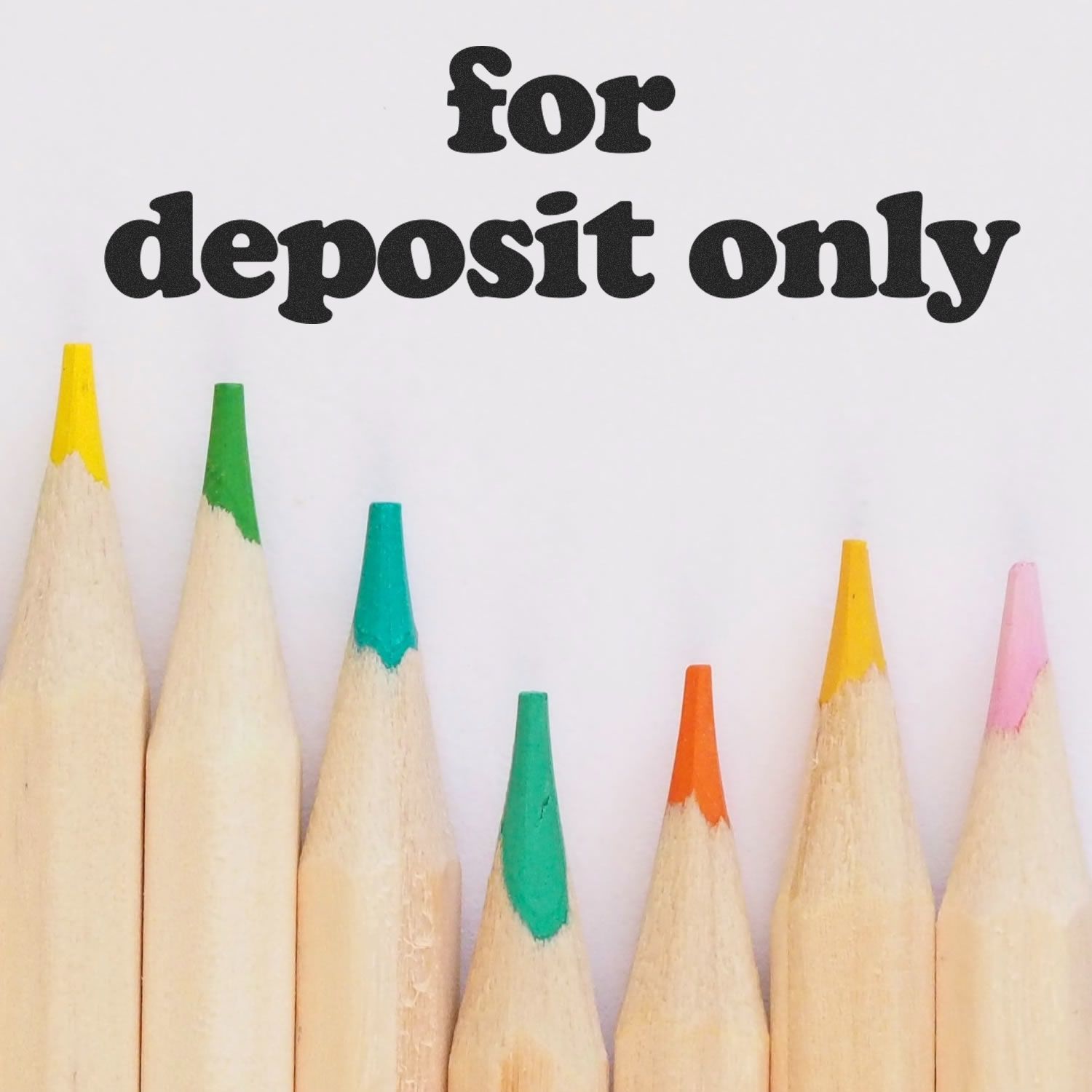 For deposit only stamp over colored pencil tips, illustrating a playful office and classroom supplies concept for writing tools.