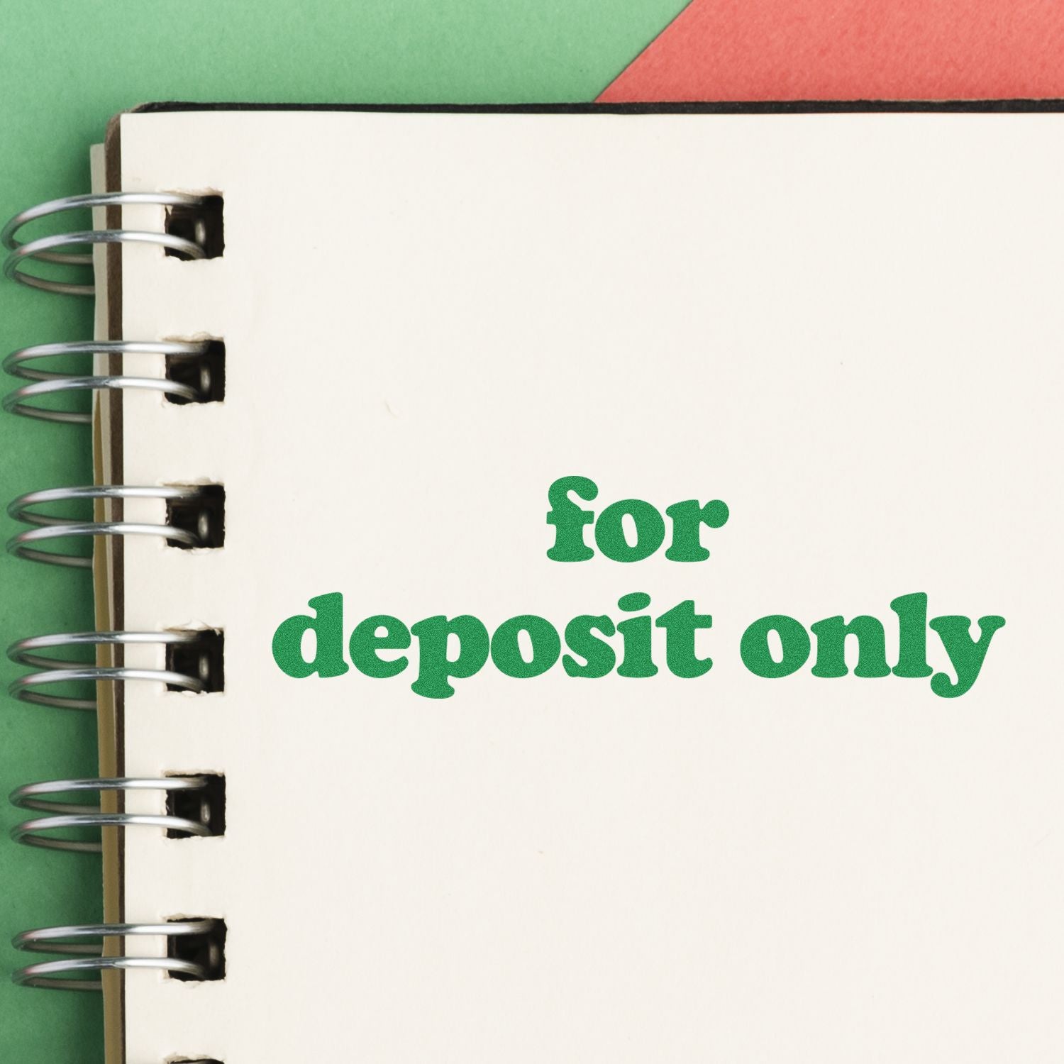 Notebook page with for deposit only stamp, highlighting deposit-only instructions for checks and payments.