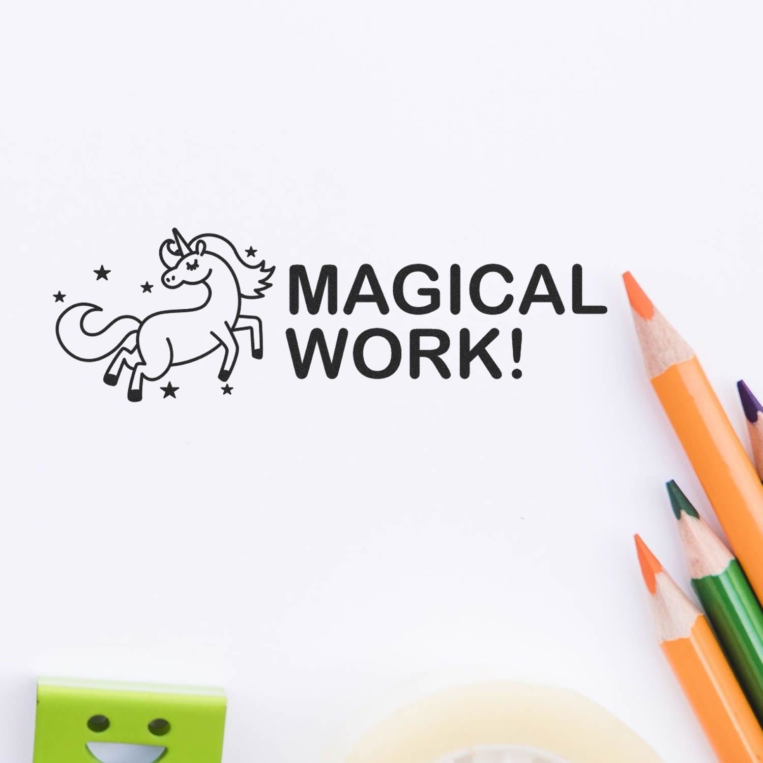 Unicorn Magical Work! quote with colored pencils on a white background.